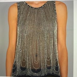 Silk and beads see through top.